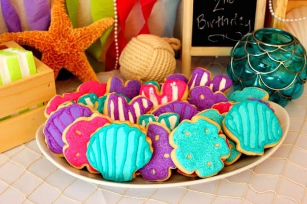 Mermaid themed birthday party with such CUTE IDEAS via Kara's Party Ideas! | Decor, cakes, cupcakes, games, printables, and MORE! #mermaidparty #mermaids #undertheseaparty #beachparty #girlparty #partyideas #partydecor (23)