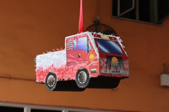 Firetruck piñata from a Firefighter Birthday Party via Kara's Party Ideas | KarasPartyIdeas.com (18)