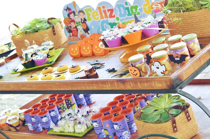 Sweet + favor cart from an Orange + Purple & Black Halloween Party on Kara's Party Ideas | KarasPartyIdeas.com (70)