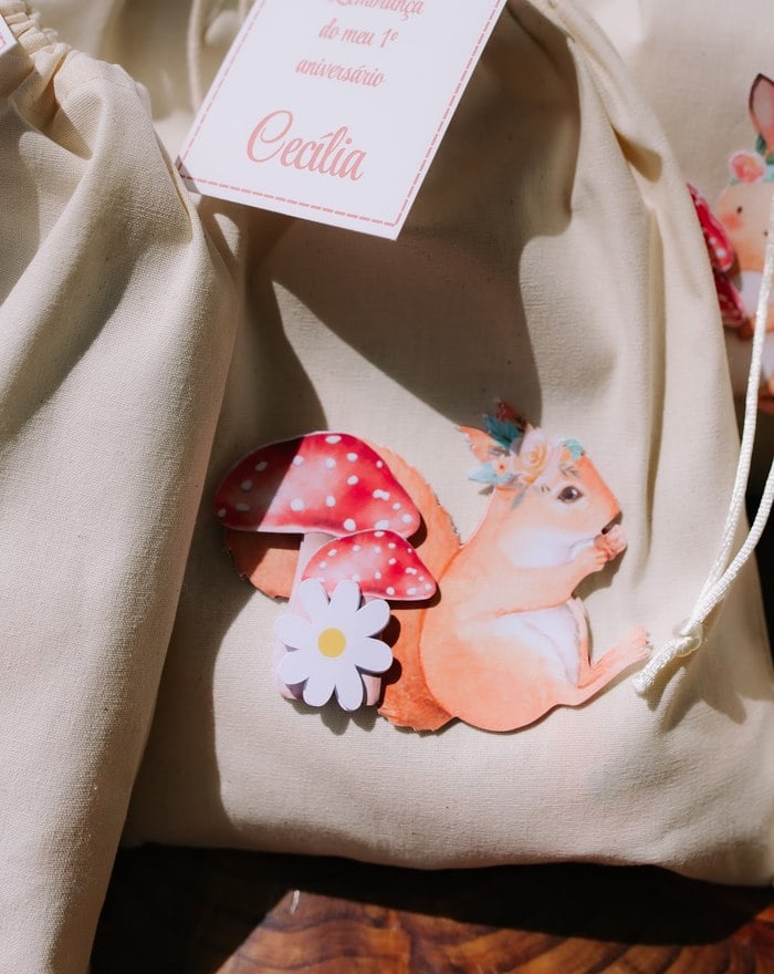 Close-up of the illustrated forest animal party favor design