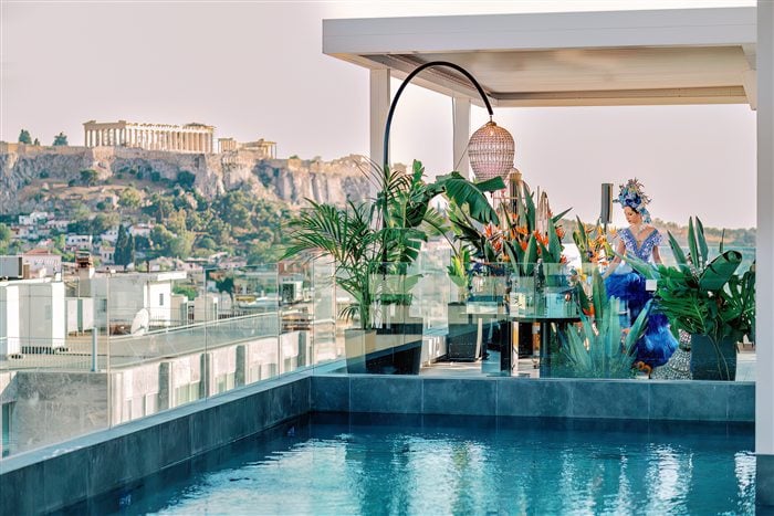Rooftop pool and modern baptism decorations overlooking the Acropolis in Athens