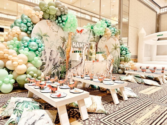 Wide view of styled children’s tables at the luxury safari birthday party