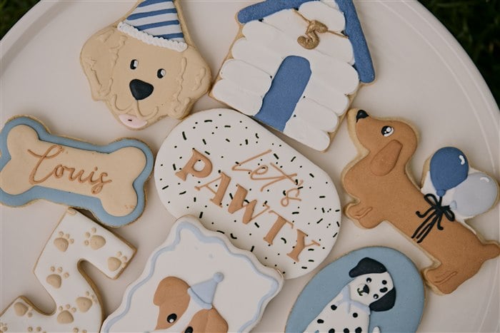 Custom puppy party cookies with dog bones paws and party hats