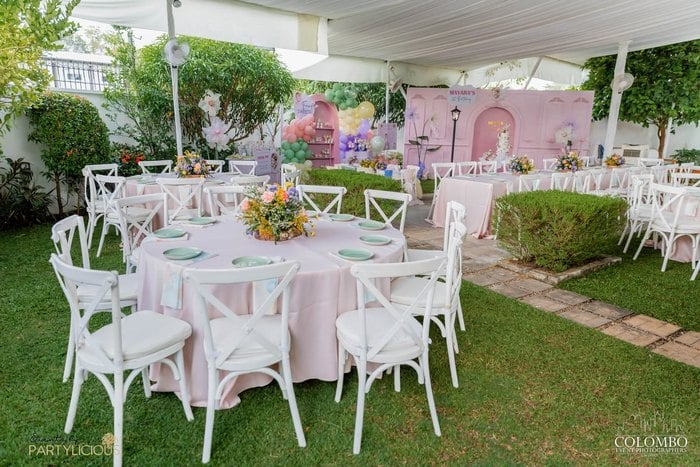 Covered garden tablescape for a fairy first birthday party