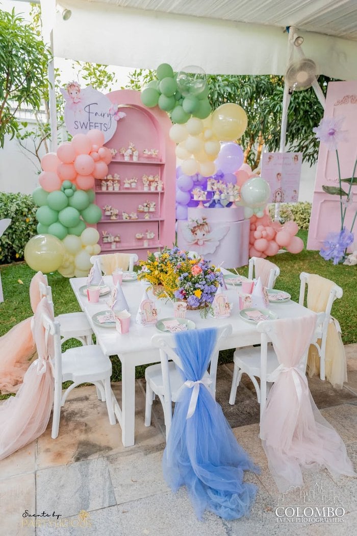 Children's fairy party table with pastel chair bows