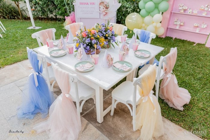 Overhead view of the colorful fairy party table