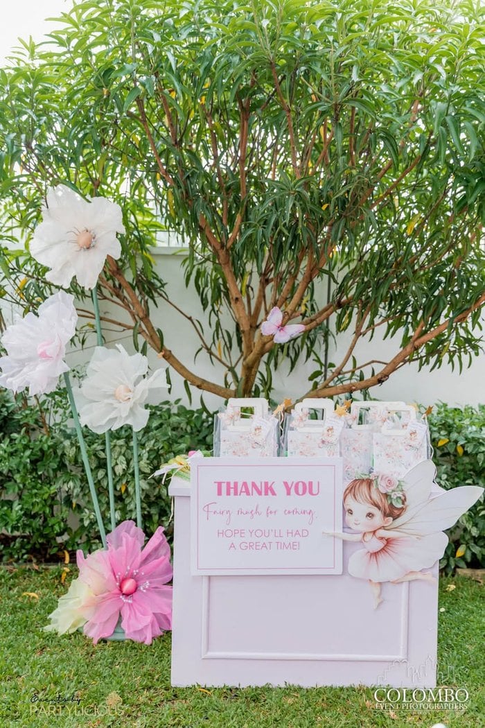 Fairy thank you sign displayed in the garden