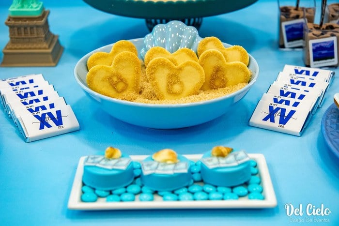 Beach-inspired cookie display with seashell and blue details