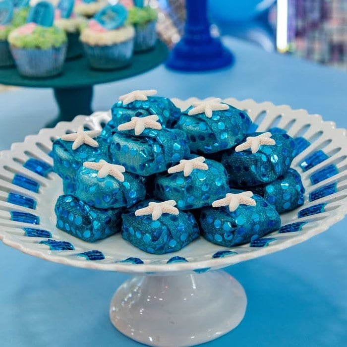 Blue wrapped party treats topped with starfish details